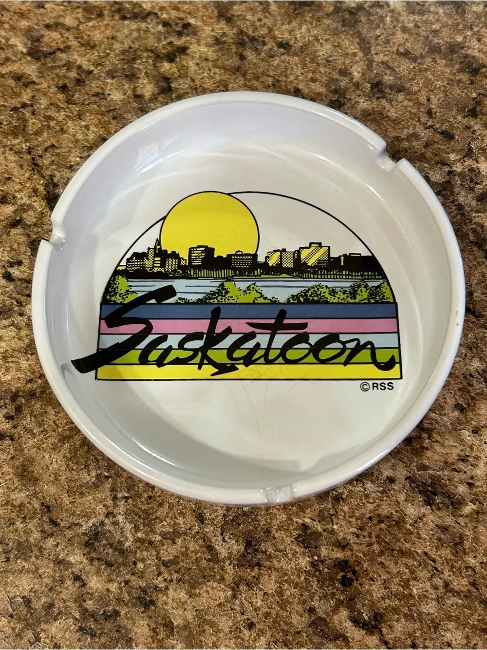 Vintage white ceramic souvenir ashtray city skyline of Saskatoon